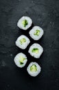 Vegetarian sushi roll with cucumber. Royalty Free Stock Photo