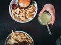 Vegetarian tasty burger and lemonade and delicious fries