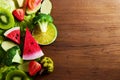 Vegetarian and vegan diet month in january called Veganuary. healthy raw vegetables and fruits on wooden background. Royalty Free Stock Photo