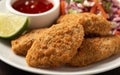 Vegetarian vegan southern fried nuggets served with sweet chilli sauce and cabbage salad