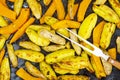 Vegetarian vegetable dish, potato wedges and pumpkin, baked grill.