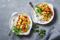 Vegetarian vegetable fajitas rice bowl on the gray table, top view.