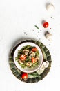 Vegetarian Vegetable green pasta spinach leaves and cherry tomatoes on liht background. Pasta vegan bowl. vertical image, place
