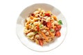 Vegetarian vegetable pasta. Pasta shells with tomato, baby carrot, paprika, beans, sweet corn and chickpea. Isolated on white bac