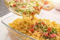 Vegetarian vegetative pasta Fusilli with tomatoes, green onions, beaten eggs and grated cheese. Royalty Free Stock Photo