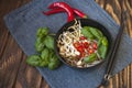 Vegetarian vietnamese style soup pho with garnishes.