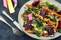 Vegetarian warm salad of stewed vegetables and chard leaves