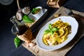 Vegetariano italiano! Tortelli with roasted pine nuts and pesto basilico Royalty Free Stock Photo