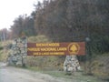 Vegetation in the background and sign indicating the entrance to the Lanin national park, Lake Hermoso area in Patagonia