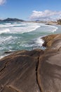 Vegetation, rocks and waves in Atalaia beach