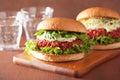 Veggie beet and quinoa burger with avocado dressing Royalty Free Stock Photo