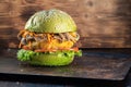 Veggie burger. lettuce, the cutlet vegetarian meat alternatives. fried onions and carrots. mushrooms with fried onions and carrots Royalty Free Stock Photo