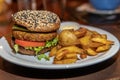 Veggie burger with tomatoes and fried