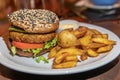 Veggie burger with tomatoes and fried