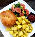 Veggie burgers with fries and salad