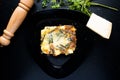 Veggie Lasagnia served in a dish isolated on dark background top view of italian food Royalty Free Stock Photo