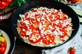 Veggie pizza. Pizza with tomatoes, shallot and fresh herbs. Cher Royalty Free Stock Photo