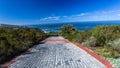 Vehicle Driveway Stone Footpath Towards Ocean Horizon