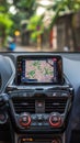 Vehicle equipped with dashboard navigation system and map display Royalty Free Stock Photo