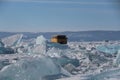 A vehicle on the frozen lake Baikal