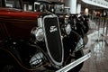 Vehicle grille and headlights  of american car Ford Model Y 1933 Royalty Free Stock Photo