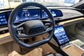 Vehicle interior of Lucid Air luxury electric car in showroom.