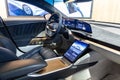 Vehicle interior of Lucid Air luxury electric car in showroom.