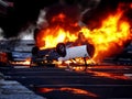 A vehicle overturned in flames