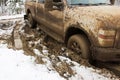 A vehicle stuck in the clay