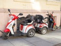 Three-wheeled electric mopeds. Comfortable moped for the city. Compact vehicle