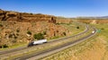 Vehicle Traffic moves along a Divided Highway in southwestern Desert Country Royalty Free Stock Photo