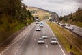 Vehicles on BR-374 highway with headlights on during the daylight obeying the new Brazilian transit laws