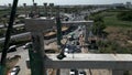 Vehicles circulating between the construction of a bridge