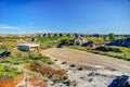 Vehicles in the parking lot at Dinosaur Provincial Park