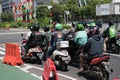 Jakarta, Indonesia - July 06, 2020: Those vehicles are waiting to crossing behind the traffic light.
