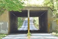 A vehicular tunnel connects opposite side of interstate Royalty Free Stock Photo