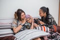 veiled girl is sad and comforted by two female friends Royalty Free Stock Photo