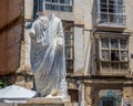 Veiled Statue of Man in Toga in the street of Cartagena, Spain