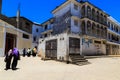 Veiled women walking through a city street Royalty Free Stock Photo