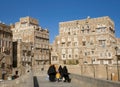 Veiled women walking in sanaa old town in yemen