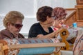 Older ladies doing bobbin lace in Vejer de la Frontera, Spain