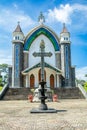 Velankanni Matha catholic church facade with big cross in foreground, Nedumkandom, Kerala, South India