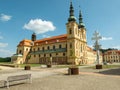 Velehrad, Czech Republic, june 2023:Papal coat of arms on cross in front of the Pilgrimage Basilica of the Assumption of the