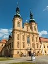 Velehrad, Czech Republic, june 2023:Papal coat of arms on cross in front of the Pilgrimage Basilica of the Assumption of the