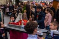 VELEZ-MALAGA, SPAIN, MARCH 24, 2018 Children participating in the procession associated with the holy week in a Spanish town Royalty Free Stock Photo