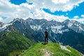 Velika Baba  - A hiking man with backpack on a hiking trail in the rocky sharp Kamnik Savinja Alps in Carinthia, Austria, Slovenia Royalty Free Stock Photo