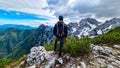 Velika Baba  - A hiking man with helmet on a hiking trail in Kamnik Savinja Alps in Carinthia, Austria, Slovenia Royalty Free Stock Photo