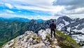 Velika Baba  - A hiking man with helmet on a hiking trail in Kamnik Savinja Alps in Carinthia, Austria, Slovenia Royalty Free Stock Photo