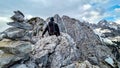 Velika Baba  - A hiking man with helmet on a hiking trail in the rocky sharp Kamnik Savinja Alps in Carinthia, Austria, Slovenia Royalty Free Stock Photo