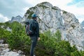 Velika Baba  - A hiking man with helmet on a hiking trail in the rocky sharp Kamnik Savinja Alps in Carinthia, Austria, Slovenia Royalty Free Stock Photo